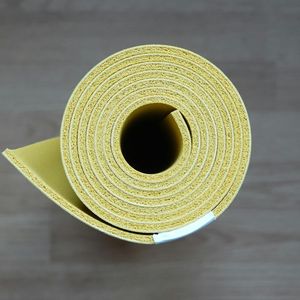 Zen-like composition of yoga blocks and a rolled mat.